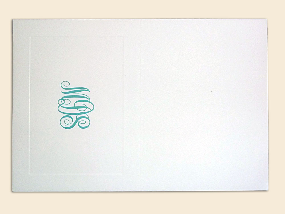 Folded card with monogram and panel